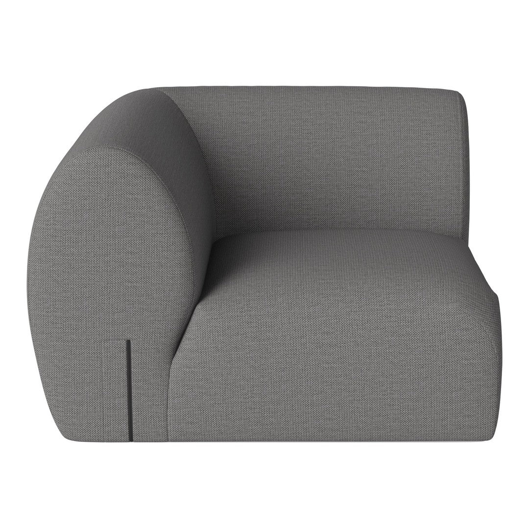 Gray upholstered corner chair with a textured pattern, featuring a modern and minimalist design.