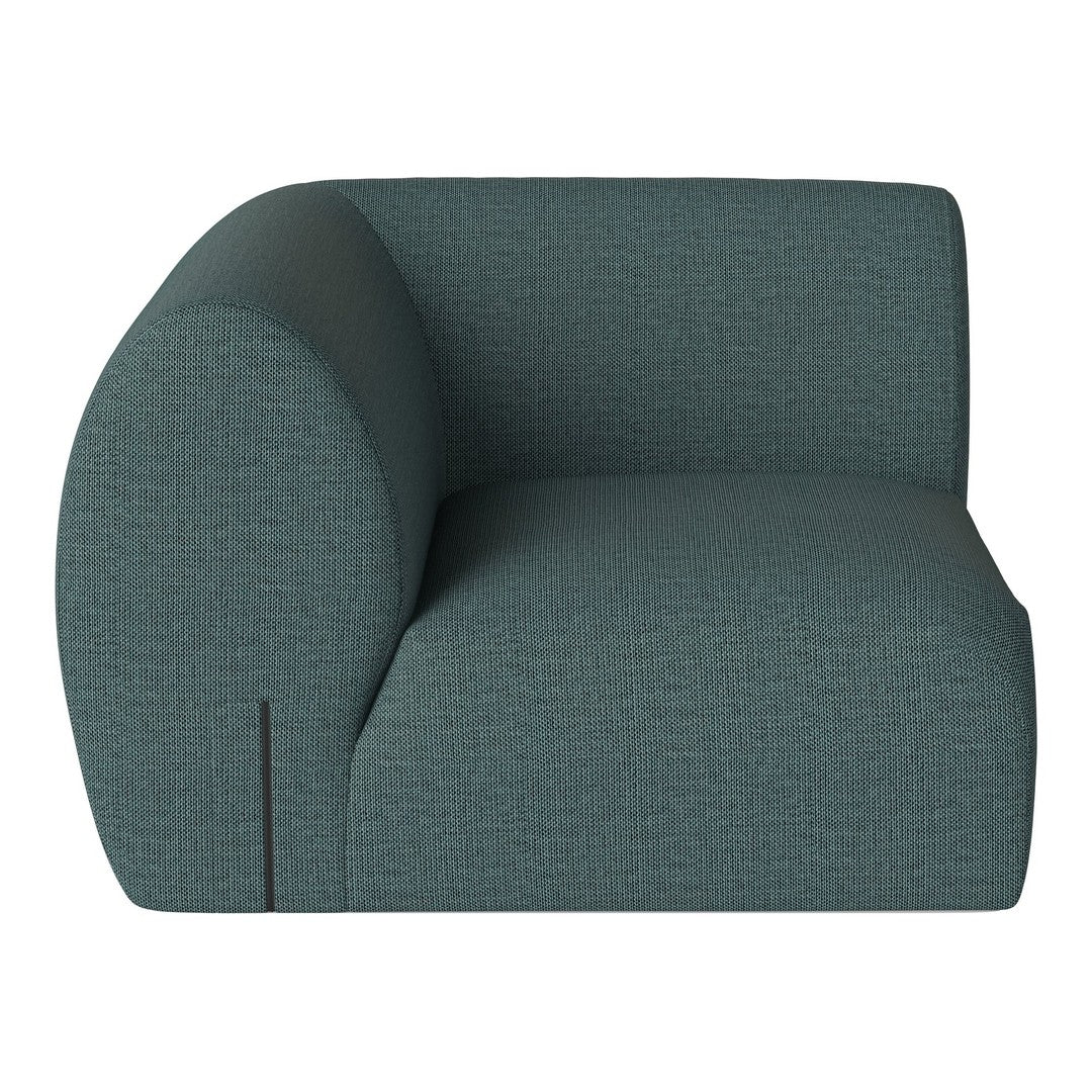Teal curved sofa with textured fabric, featuring a subtle pattern for modern home decor.