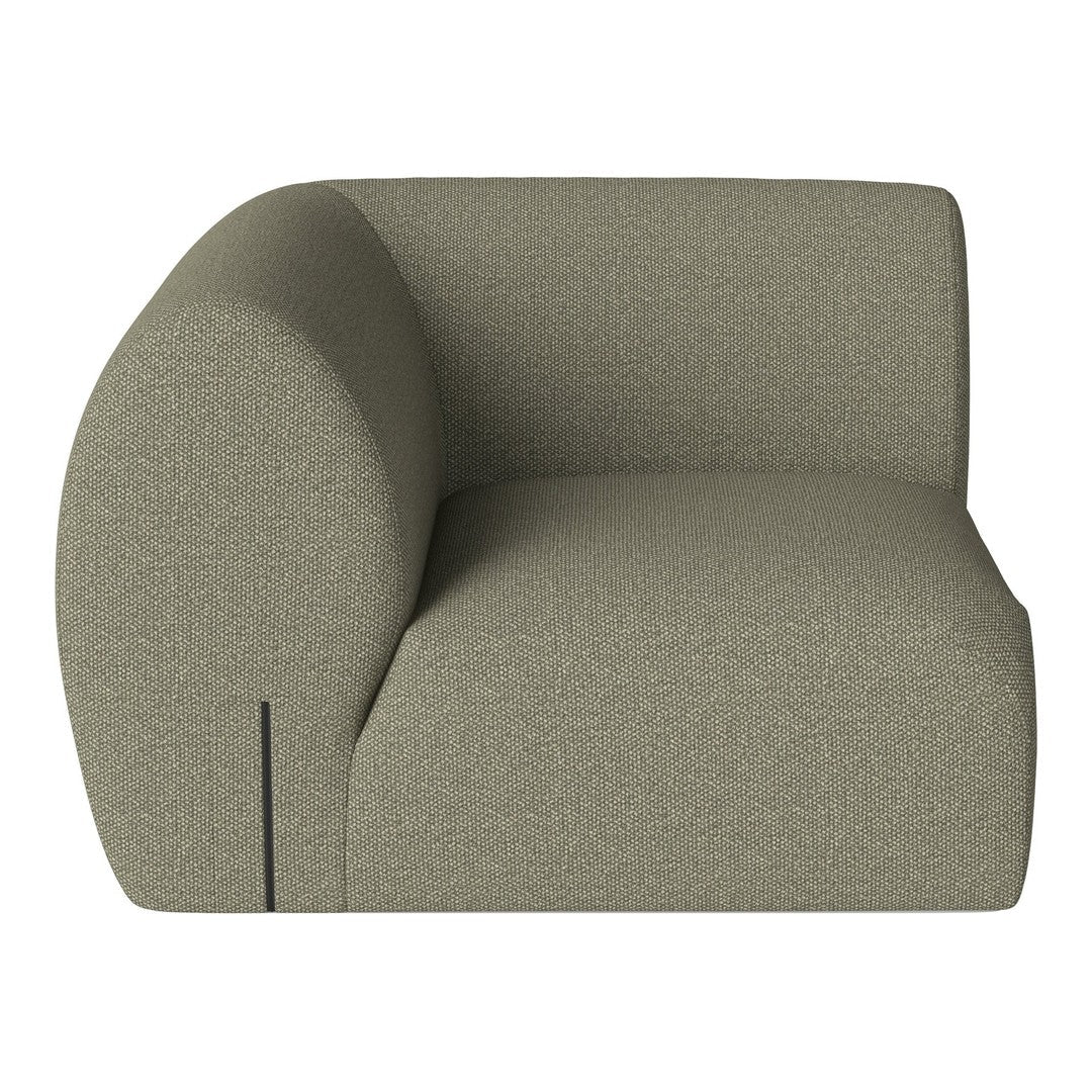 Olive green textured upholstery armchair with a contemporary rounded design, perfect for modern interiors.