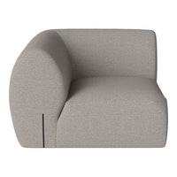 Gray upholstered armchair with a sleek, modern design and soft, textured fabric. Ideal for contemporary spaces.