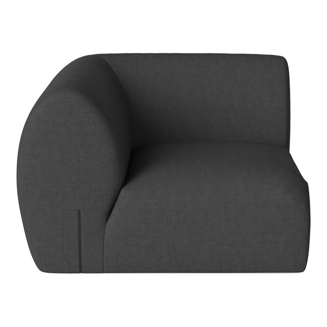 Dark grey upholstered armchair with a minimalist curved design and smooth fabric texture. Perfect for modern decor.