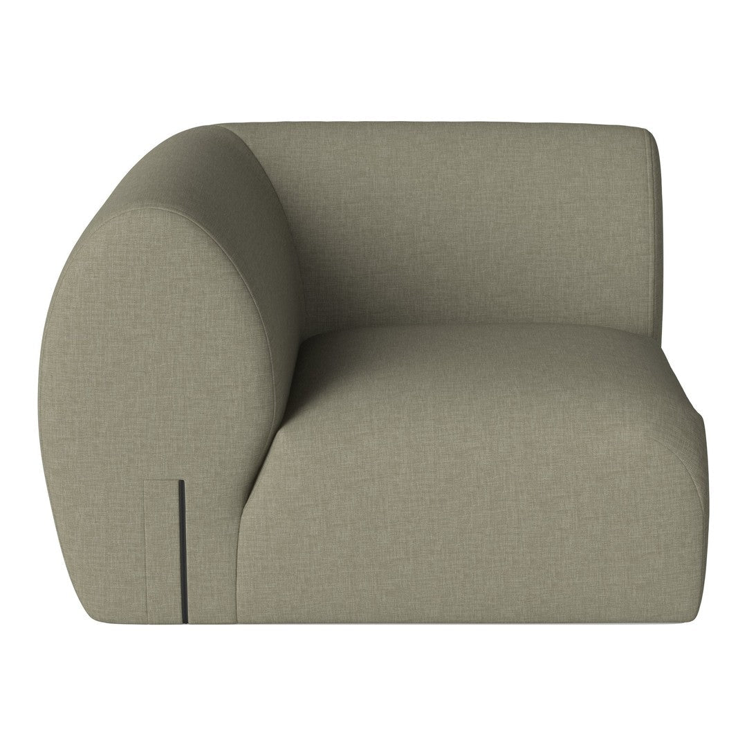 Soft olive green upholstered sofa with a rounded back and clean lines, featuring a textured fabric pattern.