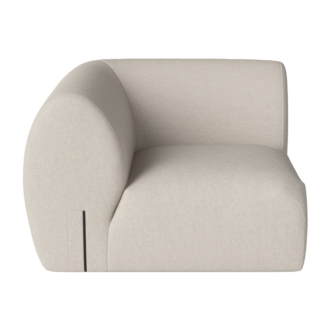 Light beige fabric sofa with a curved arm design, minimal and modern style. Simple, solid color, no patterns.