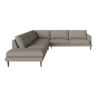 Light gray sectional sofa with a modern design and smooth fabric upholstery, complemented by wooden legs.