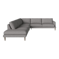 Gray sectional sofa with clean lines and soft fabric, featuring a modern design and wooden legs for a stylish look.