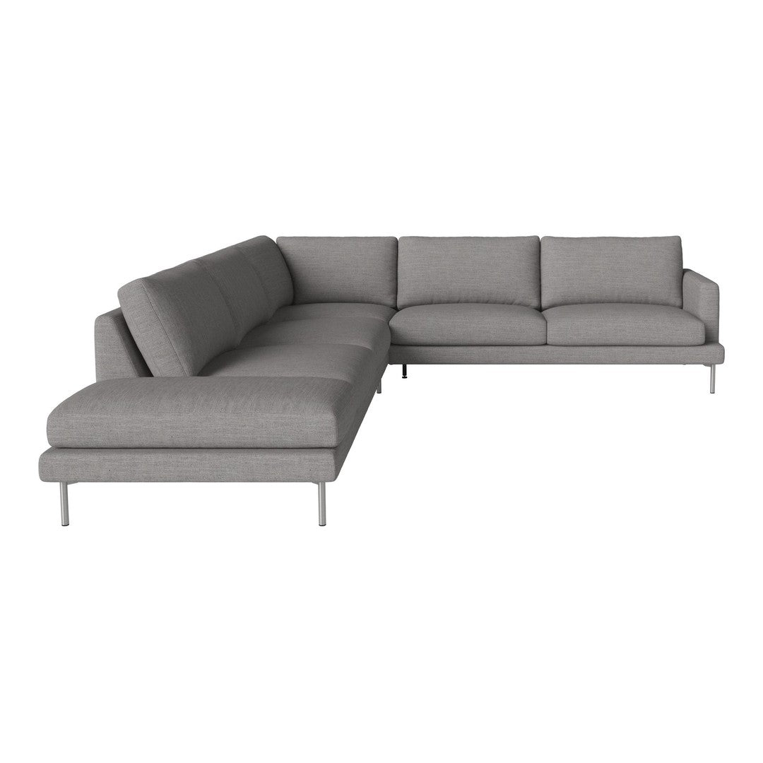 Gray sectional sofa with minimalist design and clean lines, featuring plush cushions and metal legs.