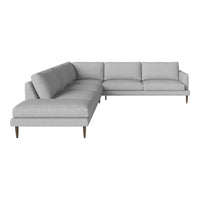 Light gray sectional sofa with a smooth fabric texture and elegant wooden legs, ideal for modern living spaces.