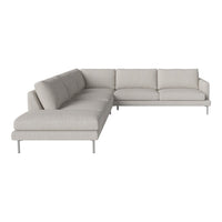Light gray sectional sofa with clean lines and a modern, minimalist design. Soft, textured fabric upholstery.