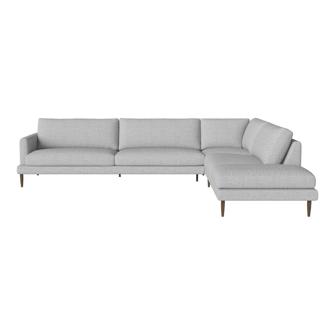 Light gray sectional sofa with a sleek, modern design and subtle textured fabric patterns. Elegant wooden legs.