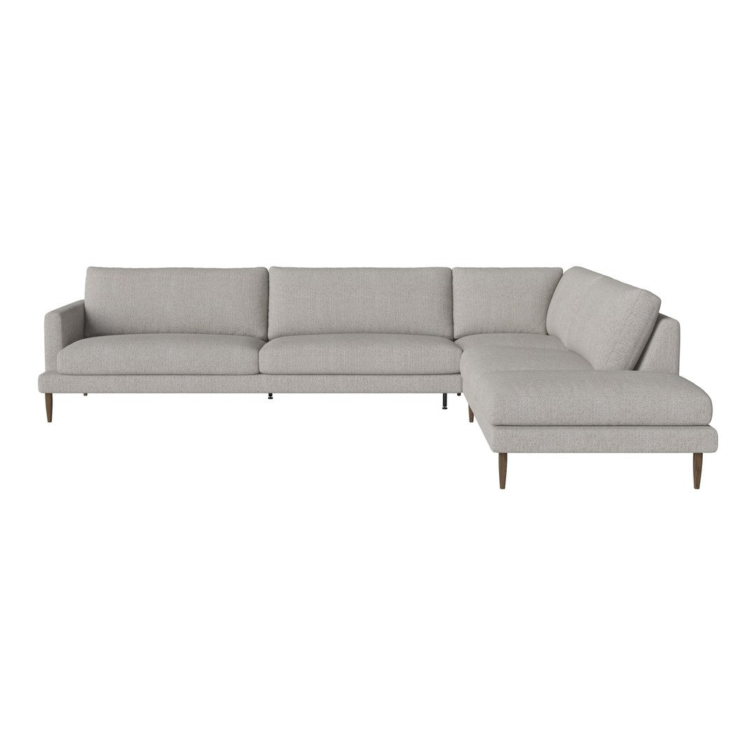 Light gray upholstered sectional sofa with a smooth, modern design and subtle texture patterns.