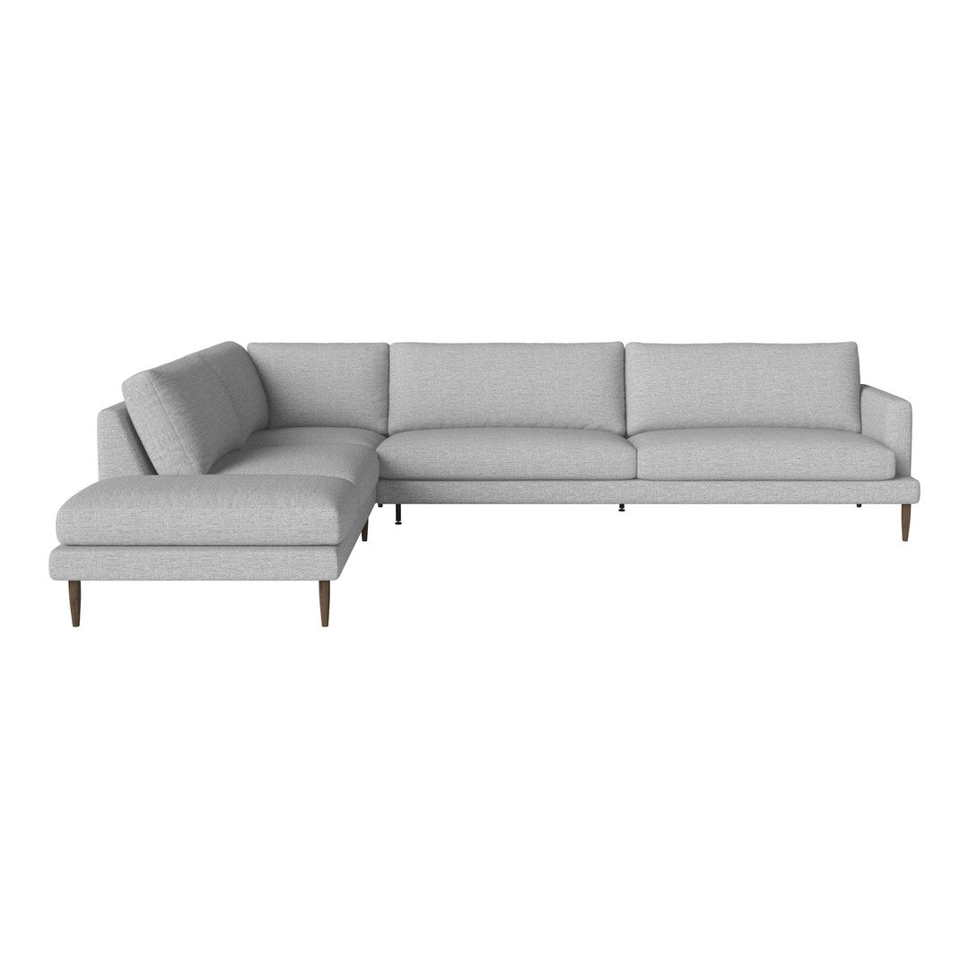 Light gray sectional sofa with a sleek, modern design and smooth fabric upholstery, featuring clean lines and minimalist style.