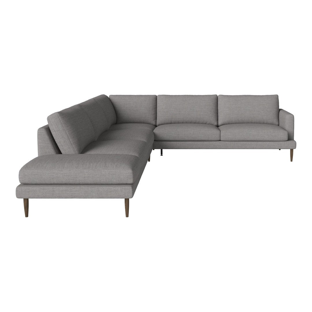 Gray sectional sofa with clean lines and a modern design, featuring solid upholstery and tapered wood legs.