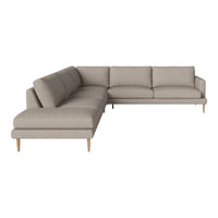 Light beige sectional sofa with a modern design and subtle textured upholstery, featuring wooden legs.