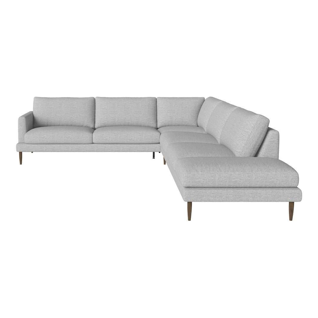 Light gray sectional sofa with subtle texture and clean lines, featuring wooden legs for an elegant touch.