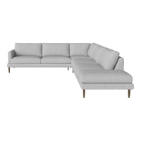 Light gray sectional sofa with subtle texture and clean lines, featuring wooden legs for an elegant touch.