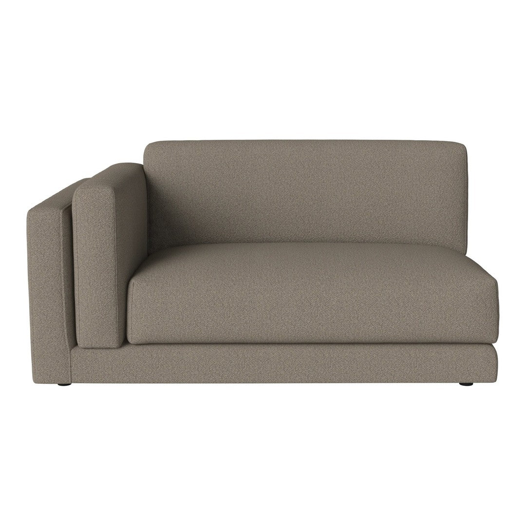 "Modern beige sectional sofa with a sleek, minimalist design and smooth upholstery."