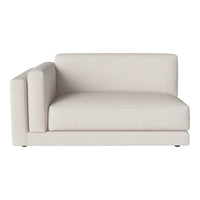 Light beige sectional sofa with a minimalist design and smooth, textured fabric. Ideal for modern decor.