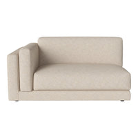 Beige upholstered sectional sofa with subtle textured pattern and clean lines, ideal for modern living spaces.