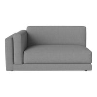 Gray fabric sofa with a modern, minimalist design and clean lines, ideal for contemporary living spaces.