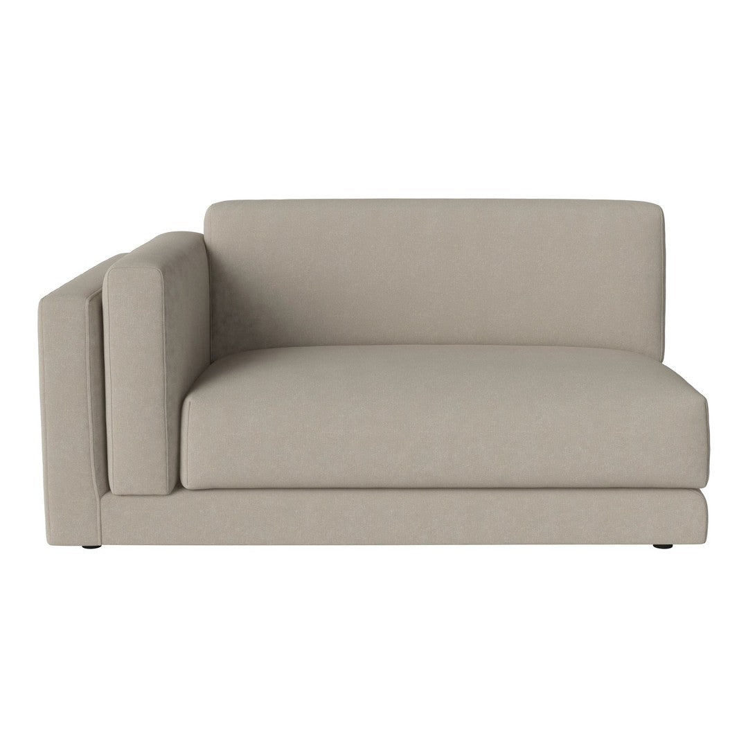 Light beige sectional sofa with a minimalist design, featuring smooth, solid-color upholstery and clean lines.