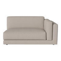 Light beige modular sofa with a textured fabric pattern, showcasing a minimalist and modern design.