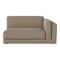 "Soft beige sectional sofa with a subtle textured pattern, perfect for modern living spaces."