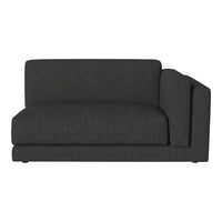 Charcoal gray upholstered loveseat with a sleek, minimalist design and subtle texture. Perfect for modern decor.