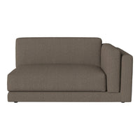 Brown textured fabric chaise lounge with a modern design and clean lines, perfect for contemporary interiors.