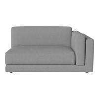 Gray upholstered sectional sofa with a smooth, modern fabric and minimalist design. Perfect for contemporary living spaces.