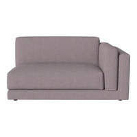 Light gray fabric sofa with a minimalist design and smooth, solid color pattern. Ideal for modern interiors.