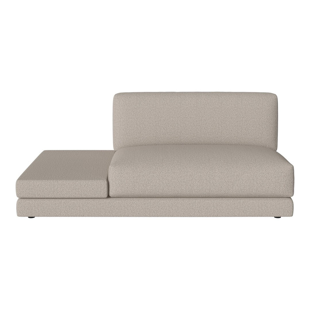 Beige sectional sofa with a minimalist design and smooth fabric texture, ideal for modern interiors.