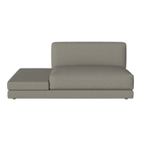 "Modern gray chaise lounge with a textured, minimalist design and clean lines, perfect for contemporary spaces."