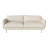 Beige minimalist sofa with smooth fabric and simple lines, perfect for modern decor.