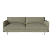 Olive green fabric sofa with smooth texture and contemporary design, featuring subtle geometric pattern.