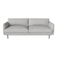 Light gray upholstered sofa with a smooth texture and minimalist design, featuring subtle stitching details.