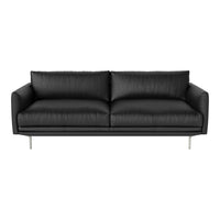 Sleek black leather sofa with a smooth texture and minimalist design, featuring polished silver legs.