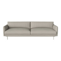 Light gray sofa with sleek, minimalist design and smooth, textured fabric, complemented by slender metal legs.