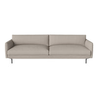 Beige upholstered sofa with clean lines and a minimalist design, featuring smooth, textured fabric and sleek metal legs.