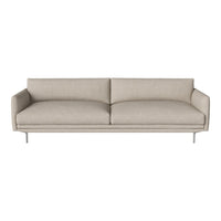 Light beige sofa with a smooth, minimalist design and clean lines, featuring a soft fabric upholstery.