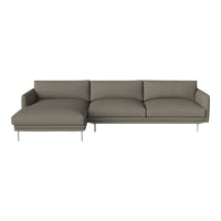 Contemporary gray sectional sofa with smooth upholstery and minimalistic design, featuring a sleek metallic base.