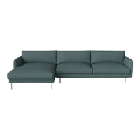 Teal sectional sofa with a modern design, featuring sleek lines and smooth fabric upholstery for a contemporary look.