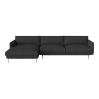 Modern sectional sofa in dark gray fabric with clean lines and minimalistic design, featuring plush cushions.