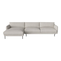 Light gray sectional sofa with clean lines and a minimalist design, featuring soft, textured upholstery.