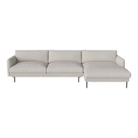 Light gray sectional sofa with a minimalist design and smooth, solid fabric texture. Stylish modern home furniture piece.