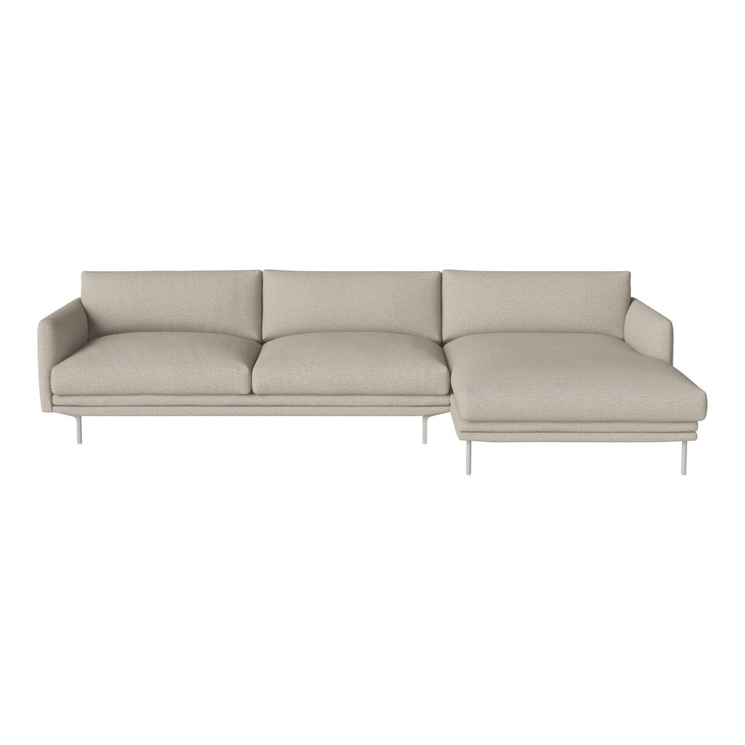 Light beige sectional sofa with a modern, minimalist design and plush cushions, showcasing a smooth fabric texture.