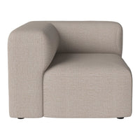 Beige textured modular sofa with a minimalist design and curved arm, perfect for modern decor.