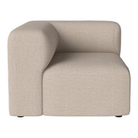 Beige upholstered corner chair with a textured, minimalist design for a modern aesthetic.