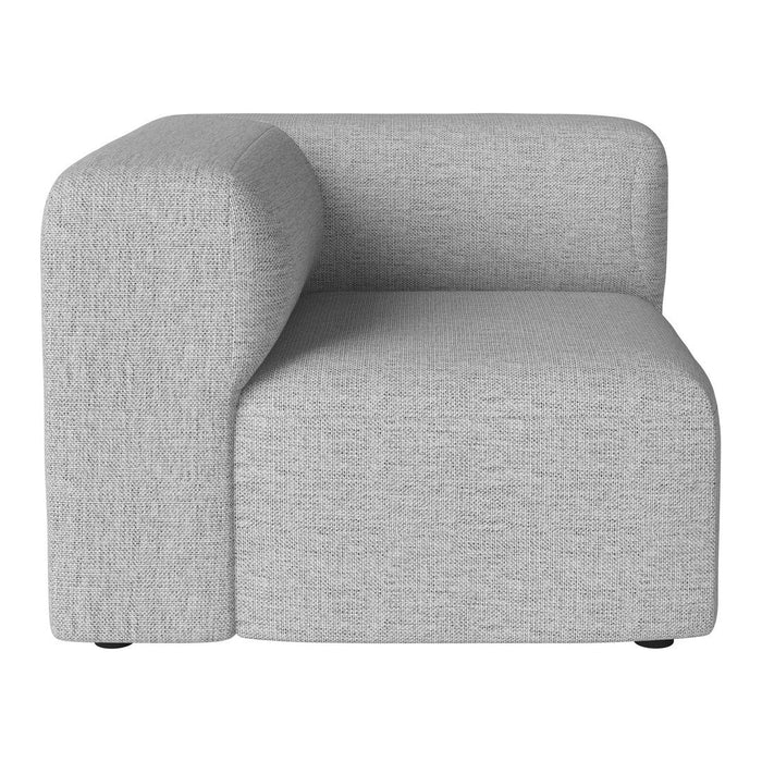 Gray fabric corner chair with a smooth texture and minimalist design, perfect for modern interiors.