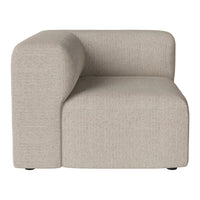 Beige upholstered corner sofa with a textured, minimalist design, featuring soft, neutral tones. Perfect for modern decor.