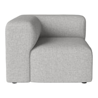Light gray modular chair with a sleek, minimalist design and subtle textured pattern for modern decor.